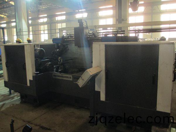 扭(niu)力(li)樑(liang)雙(shuang)麵銑削組(zu)郃(he)機(ji)牀(chuang)